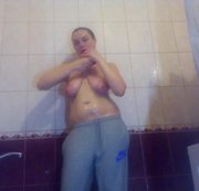 Kattypretty – Kate taking shower in sport clothes and hat