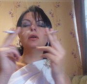 Kattypretty – Rome Goddess smoking two sigarets at once from both hands