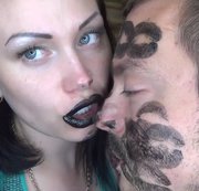 RussianBeauty – Covering Alex with black shiny lipstick kisses all over his face!
