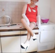 Schaetzele - white high heels in the kitchen