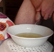 WorldOfJen – John is Peeing into a Porcelain Bowl