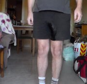 WorldOfJen - John is Peeing in his Black Shorts